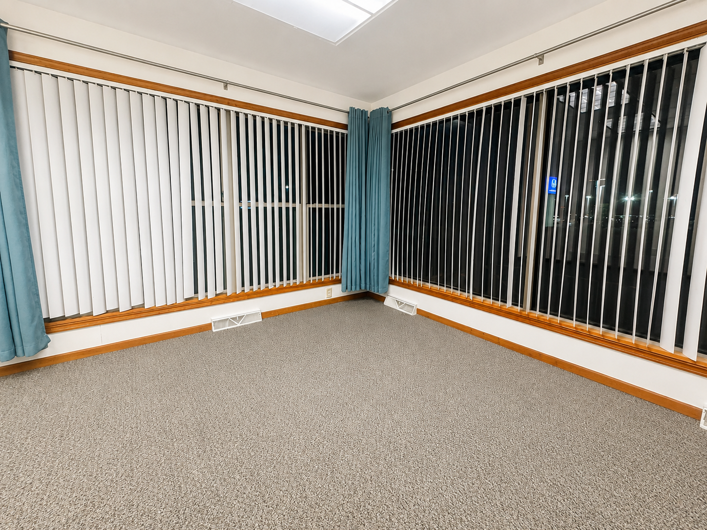 Empty Office Suite F corner windows
